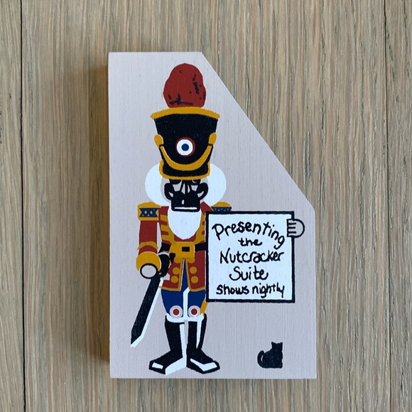 Nutcracker with Nutcracker Suite Sign - The Cat's Meow - Picture 1 of 1
